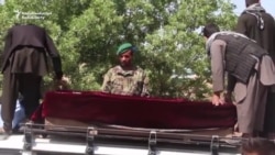 Afghan Soldiers' Coffins Transported After Balkh Base Assault