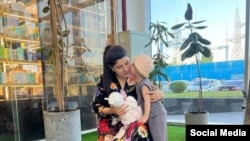 Рухшона Хакимова с детьми