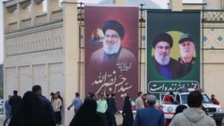 نمونه‌ای از بیلبوردهای تبلیغاتی جمهوری اسلامی با تصاویر حسن نصرالله و عباس نیلفروشان