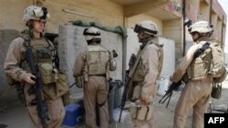 بر اساس طرح پیش نویس توافقنامه امنیتی آمریکا و عراق، نيروهای آمريکايی تا تابستان سال ۲۰۰۹ از تمامی شهرهای آن کشور خارج خواهند شد.(عکس: AFP)