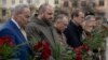 U.S. Senate Majority Leader Chuck Schumer, Ukrainian Defense Minister Rustem Umerov, Chief of the Ukrainian Armed Forces Colonel General Oleksandr Syrskiy, and Senators Michael Bennet and Maggie Hassan visit the Cemetery of the Defenders in Lviv, Ukraine, on February 23.
