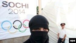 Оьрсийчоь -- Къилбаседа Кавказехь Олимпиада дIаяхьа кхераме хилар гойтуш кечйина коллаж