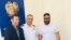 Armenia - Mnatsakan Bichakhchian C), the head of an Armenian police department on visas and passports, poses for a photo with U.S. celebrity Dan Bilzerian (R) and his brother Adam in Yerevan, 27 August 2018.