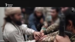 Тоҷике занҳояшро канор гузошта бо писари хурдаш ба ДОИШ пайвастааст