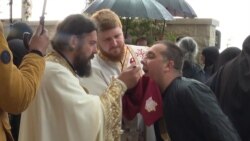 Worshippers Share Communion Spoon As Montenegro Relaxes COVID-19 Lockdown