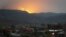 Explosions are seen over the mountains from Stepanakert, the main city of the breakaway Nagorno-Karabakh region, on October 30.