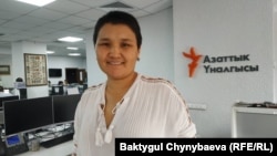 Рита Карасартова.