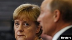 Канцлер Німеччини Анґела Меркель і президент Росії Володимир Путін, 21 червня 2013 року