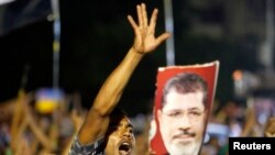 حامیان محمد مرسی در قاهره- پنجشنبه، ۱۳ تیرماه ۱۳۹۲