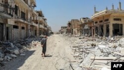 Սիրիա - Ավերակների վերածված թաղամասեր Իդլիբ նահանգի Խան Շեյխուն քաղաքում, օգոստոս, 2019թ․