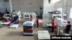 Armenia --Workers at a plastics manufacturing plant in Yerevan.