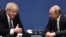 British Prime Minister Boris Johnson speaks with Russian President Vladimir Putin during the International Libya Conference in Berlin in January 2020.