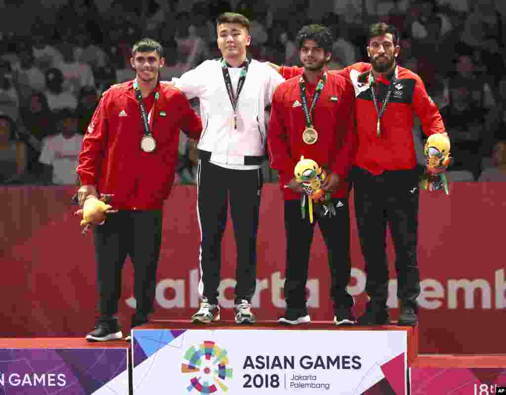 Дархан Нортаев (в белой форме) также был лучшим среди джитсеров в весовой категории до 62 килограммов. В финале он был сильнее Омара аль-Фадлида из ОАЭ.