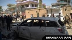Ця світлина зроблена на місці попереднього гучного нападу в Кабулі – 22 квітня поблизу центру реєстрації виборців. Її зробив Шах Марай, журналіст агенції France-Presse, який загинув внаслідок вибуху 30 квітня