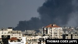 Дим над містом Газа після повітряного удару Ізраїлю