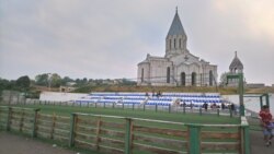Nagorno-Karabakh -- A football pitch for children and an Armenian church in Shushi (Shusha), September 6, 2018.