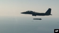 Південнокорейський винищувач F-15K випускає ракету Taurus під час військових навчань, 24 березня 2023 року. Ілюстративне фото