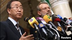 بان گی مون در کنار علی لاریجانی