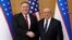 U.S. Secretary of State Mike Pompeo (left) shakes hands with Uzbek Foreign Minister Abdulaziz Kamilov in Tashkent on February 3.