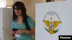 Nagorno-Karabakh - A voter at a polling station in Stepanakert, 19Jul2012.