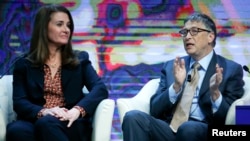 Билл Гейтс жубайы Мелинда менен. Давос, 23-январь, 2015-жыл.