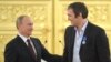 Ресей президенті Владимир Путин (сол жақта) және хокейші Алексадр Овечкин. 2014 жыл. 
