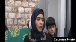 Кумринисо Хафизова вместе с сыном Абубакром
