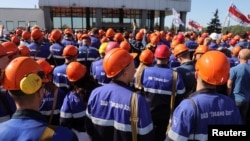 Last summer, workers at a number of state-own companies protested and went on strike to voice opposition to the presidential election results.
