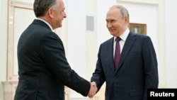 Stiv Uitkoff və Vladimir Putin