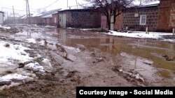 Armenia -- A muddy street in Gyumri.