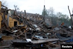 Наслідки удару російської балістичної ракети по Києву