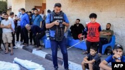 Գազայի Դեյր ալ-Բալահ թաղամասի բնակիչները պատրաստվում են հուղարկավորել զոհված մանուկներին, 31 հոկտեմբերի, 2023թ.