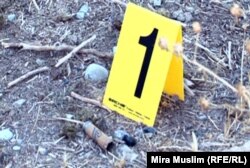 Қақтығыс орнынан табылған гильза. Шымкент, 30 қазан 2012 жыл.