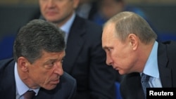 Дзьмітрый Козак і Ўладзімір Пуцін, лістапад 2013 году. Ілюстрацыйнае фота