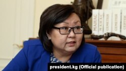 Мира Карыбаева.