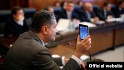 Armenia - Prime Minister Tigran Sarkisian demonstrates a first-ever Armenian-designed smartphone, Yerevan,6Dec2013.