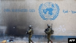 Izraelski vojnici unutar evakuiranog kompleksa Agencije Ujedinjenih naroda za pomoć palestinskim izbjeglicama (UNRWA) u gradu Gazi, 8. februar 2024.