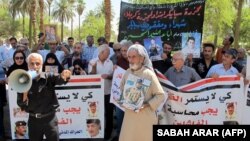 تجمع اعتراضی بستگان قربانیان کشتار اسپایکر در بغداد، همزمان با اولین سالگرد این کشتار در خرداد ۹۴