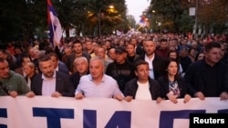Bosnian Serb protesters march against the allegedly rigged vote in Banja Luka on October 6.