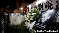 فعالان مدافع جنبش دمکراسی در هنگ کنگ یاد لیو شیابو
گرامی داشتند