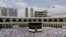 SAUDI ARABIA -- Muslim pilgrims circumambulate around the Kaaba, the cubic building at the Grand Mosque, ahead of the Hajj pilgrimage in the Muslim holy city of Mecca, August 8, 2019