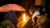 Lighting candles for Oliver Ivanovic in downtown Belgrade on October 12.

