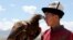 KYRGYZSTAN -- A Kyrgyz berkutchi (eagle hunter) attends a traditional ethnofestival in Ton village near Issyk-Kul lake, July 15, 2019