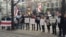 Belarusians protest outside the Skoda offices in downtown Prague.