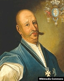 Микола Василь Потоцький (1707/1708–1782) – магнат, меценат, який оплатив перебудову церкви та монастиря у Почаєві, які тоді належали греко-католикам