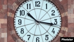 Armenia -- The clock on the main government building facing Republic Square in Yerevan, 26Jan2012.