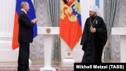 Путін аплодує Іларіону. 2016 рік