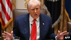 US President Donald Trump speaks at the White House on October 14.