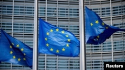 Belgium - European Union flags fly outside the European Commission headquarters in Brussels, March 1, 2023.