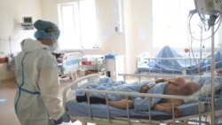 Armenia -- A healthcare worker clad in protective gear looks after COVID-19 patients at the Surb Grigor Lusavorich Medical Center, Yerevan, June 5, 2020.